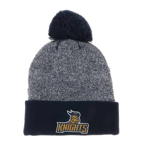 This ribbed knit cap features a marled acrylic yarn crown with a solid color cuff and matching pom.