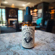 Experience the artisanal excellence of Sword & Trowel Beard Oil, meticulously handcrafted by a local pastor. Nourish your beard with the finest ingredients, leaving it soft, healthy, and irresistibly fragrant with a blend of cedarwood, orange peel, and a