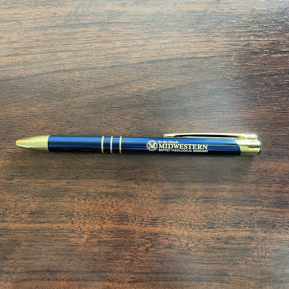 Retractable pen with gold clip