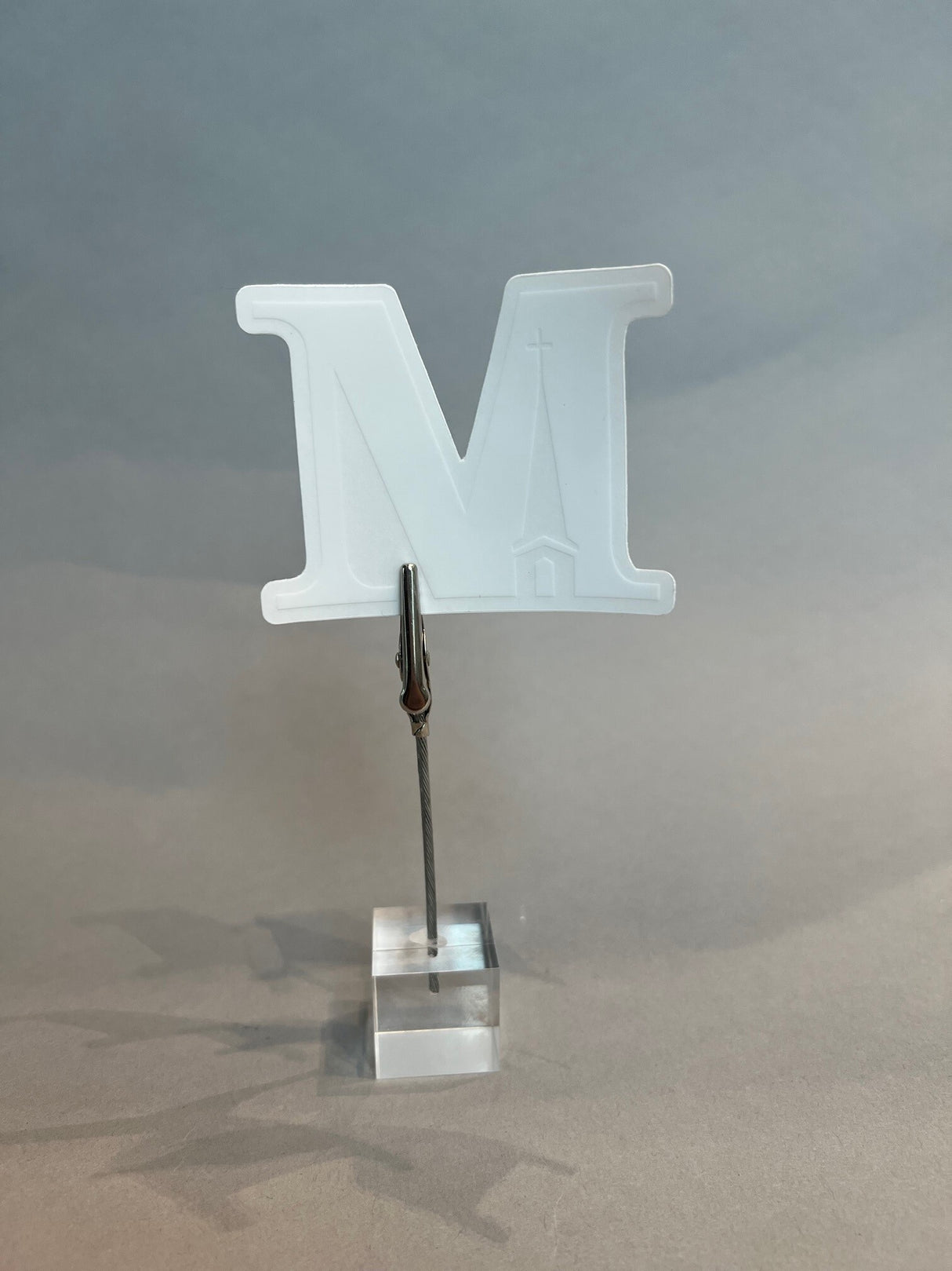 White M with clear background, 3" x 2.25" sticker