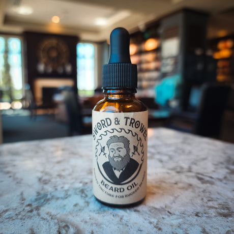Experience the artisanal excellence of Sword & Trowel Beard Oil, meticulously handcrafted by a local pastor. Nourish your beard with the finest ingredients, leaving it soft, healthy, and irresistibly fragrant with a blend of cedarwood, orange peel, and a 