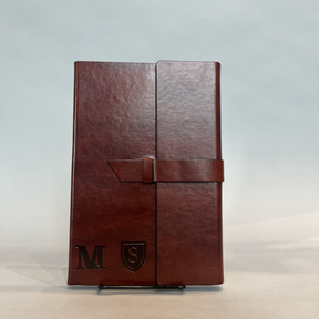 Contains a 9" x 6" notebook with 80 ivory lined sheets.